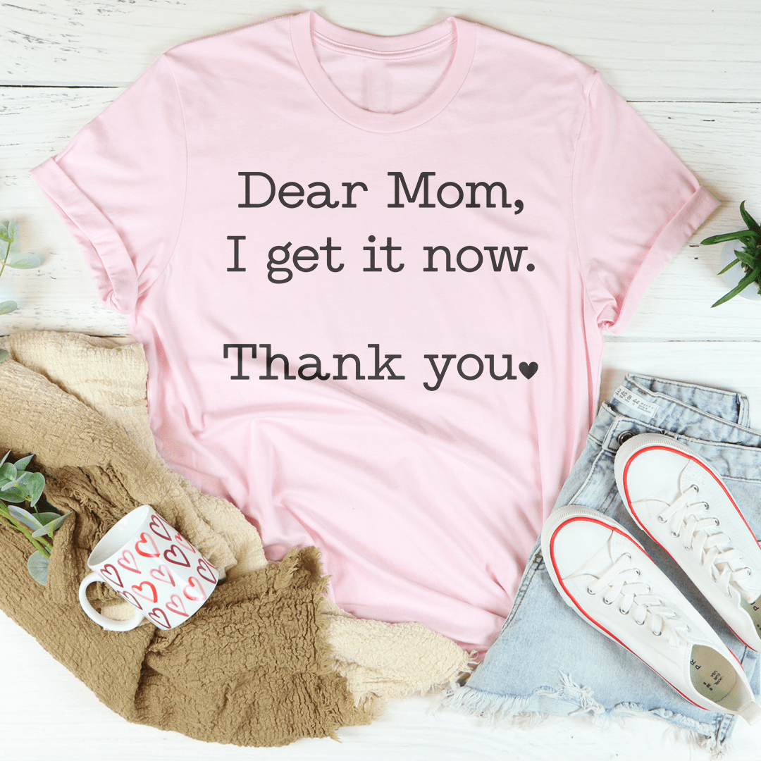 Dear Mom I Get It Now Thanks T unisex peachy tee shirt with short sleeves and soft cotton graphic print