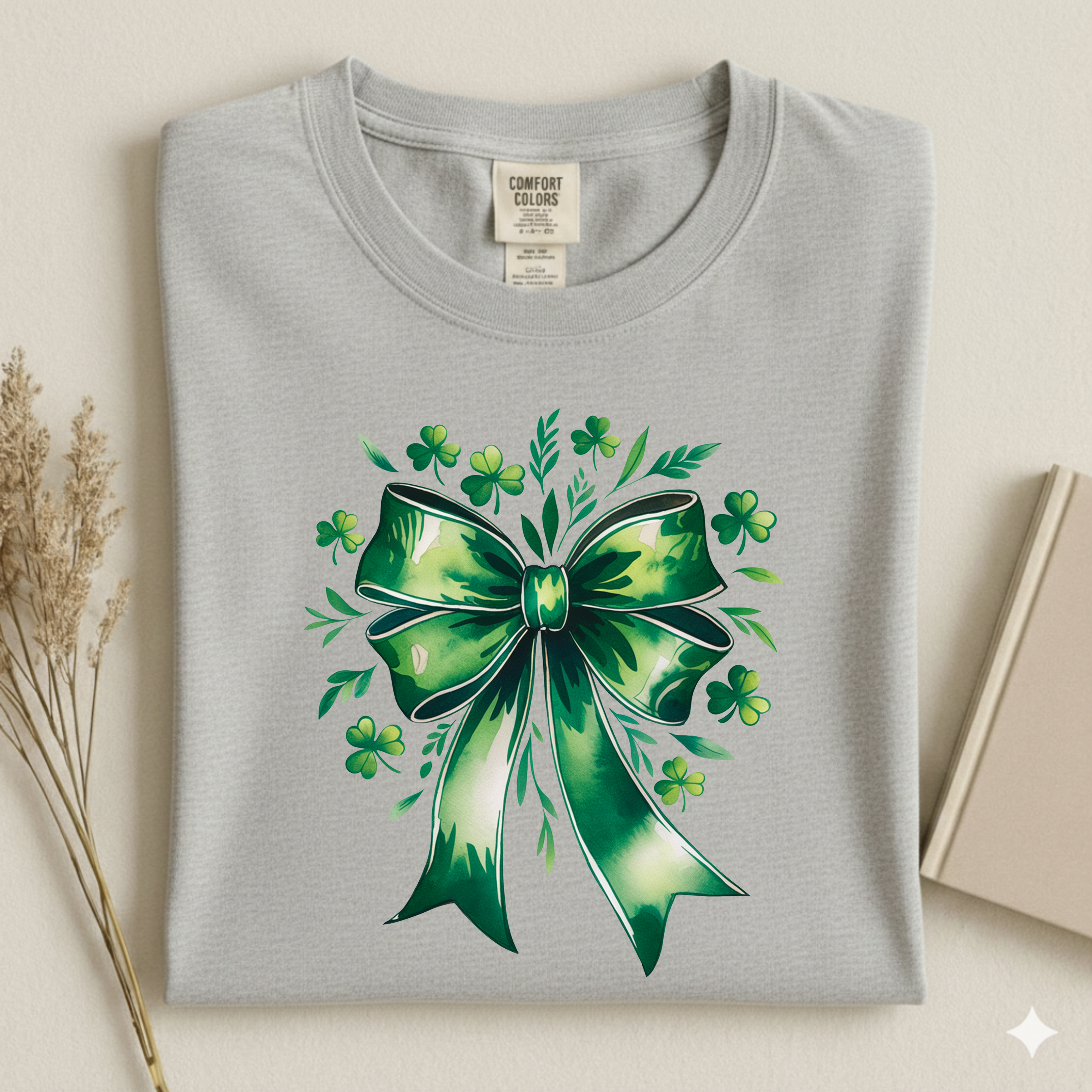St. Patrick's Day Shamrock Bow T-Shirt with shamrock bow graphic on a premium cotton unisex tee